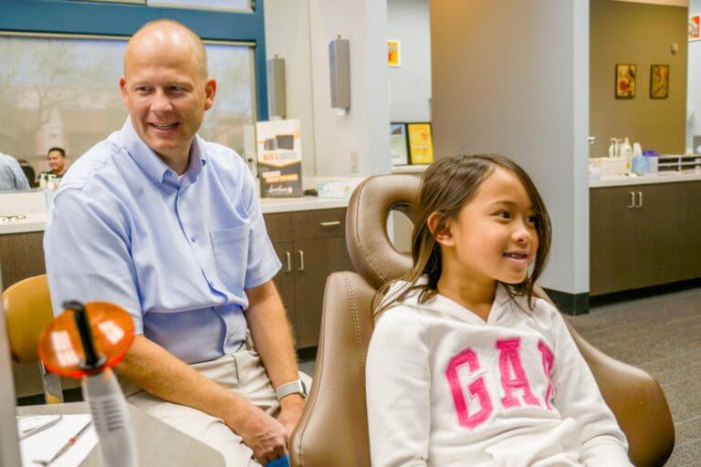 image of a doctor laugh with his patient