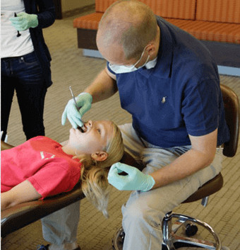 image of a doctor treating his patient